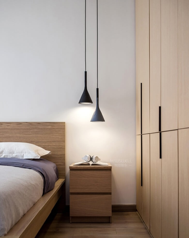 Hanging lamp in wood and aluminum in a modern Nordic bottle design